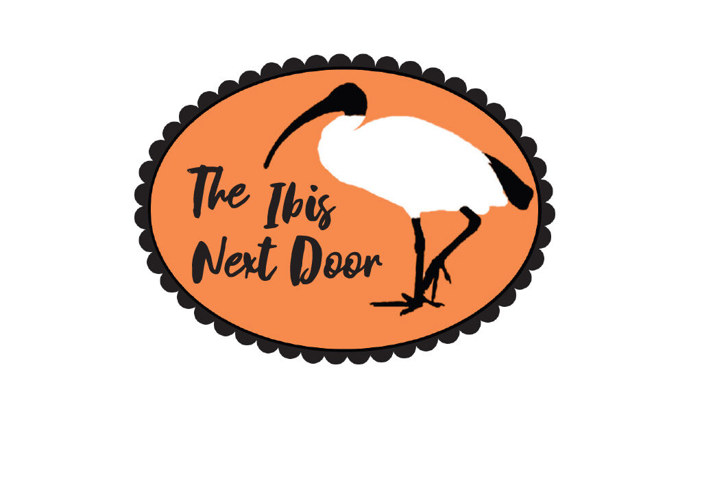Oval logo with ibis silhouette and text